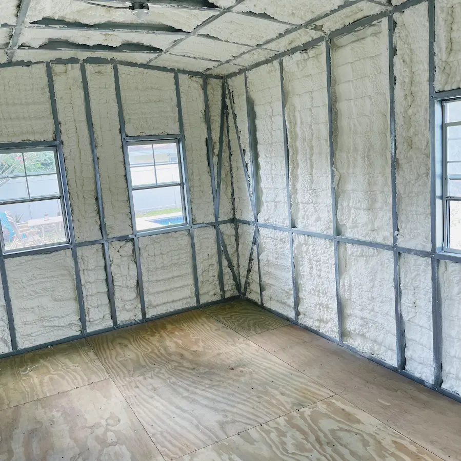 Closed-cell spray foam insulation applied to wall cavities in a residential project in Atlantic Beach